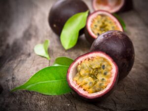 Sliced passion fruit on wood surface