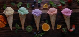 photo of Ice cream cones on wood table