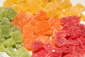 photo of green yellow orange and red fruit gummies