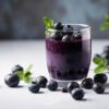 Blueberry Smoothie On White Background | Puree Arete blueberry superfruit photo