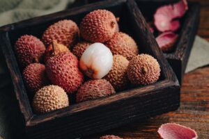 lychee in a wooden box photo