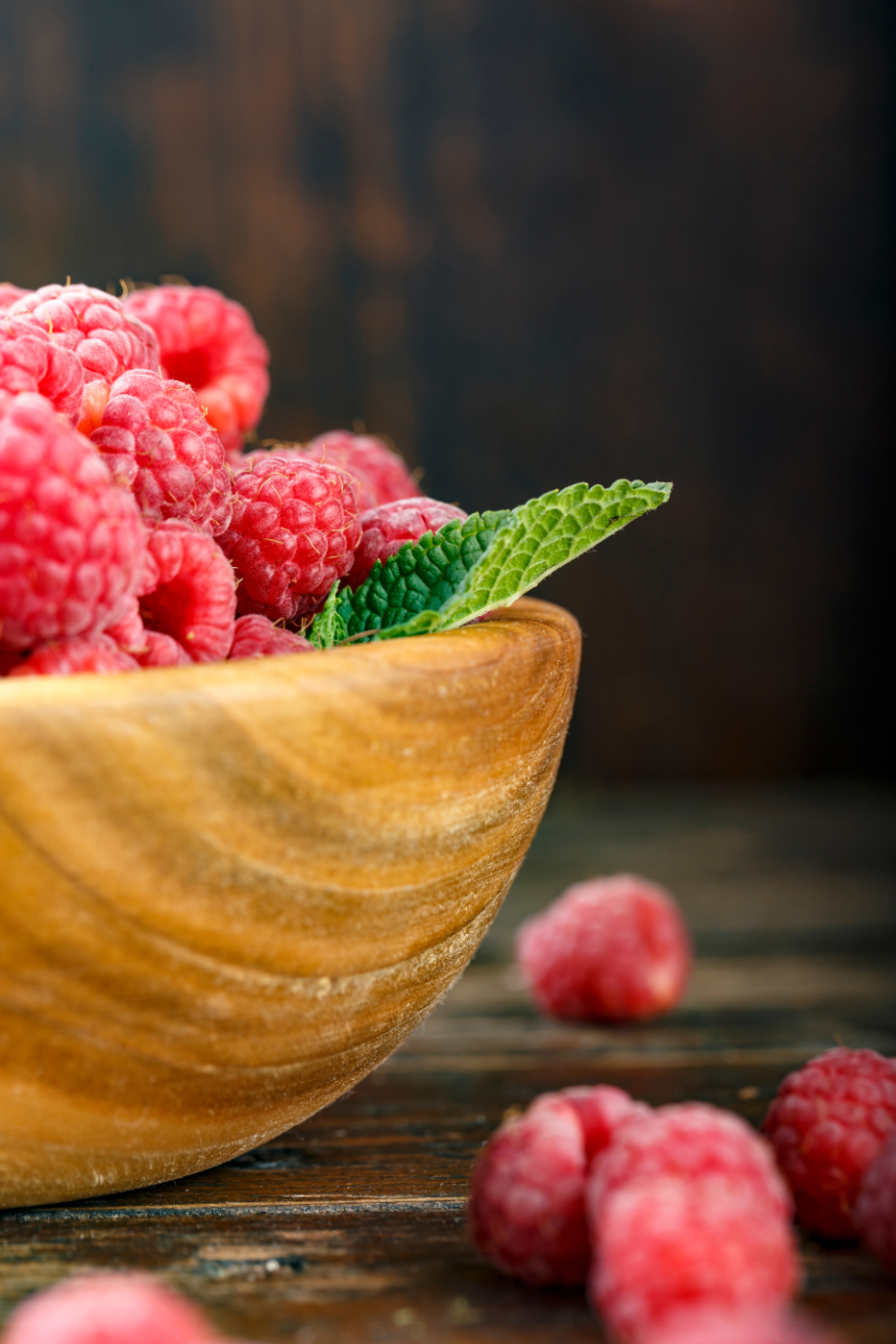 organic raspberries on the table | Puree Arete photo of fresh raspberries