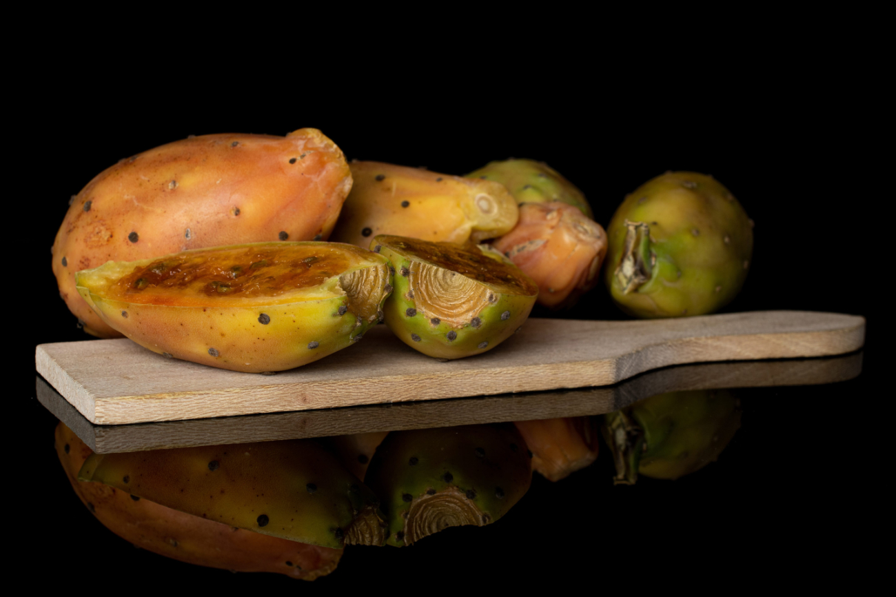 Prickly pear fruit on a wooden board photo