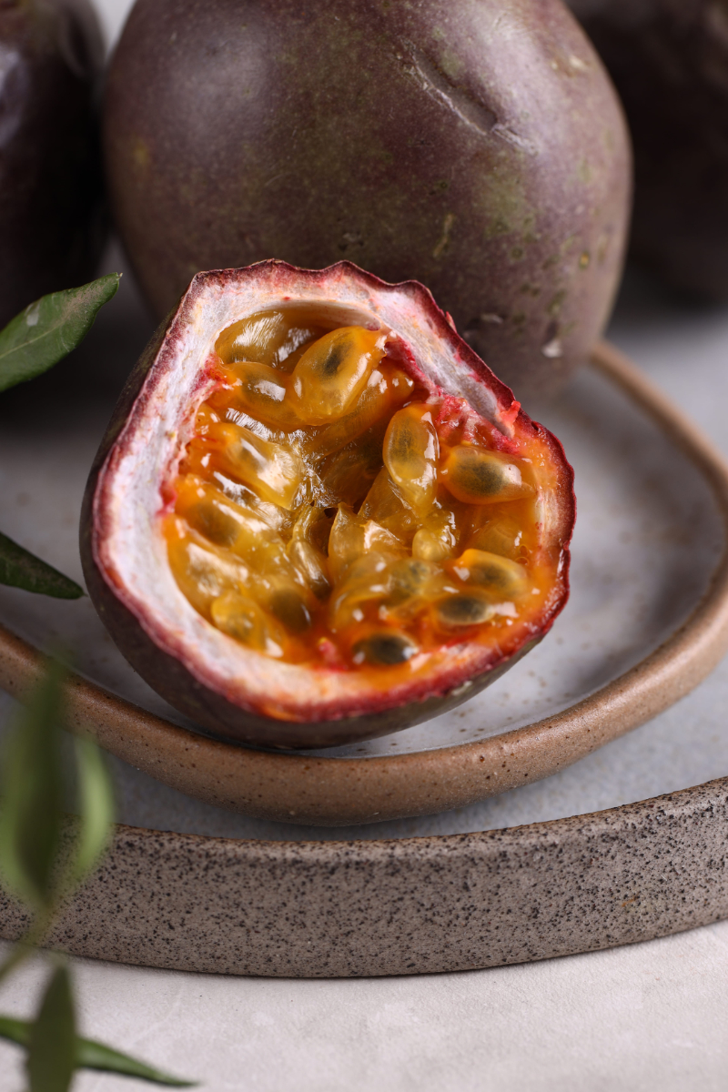 ripe passion fruit on a plate