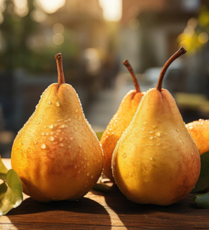 delicious fresh pears fruits with black and blur background | Purée Arêté delicious golden pears photo